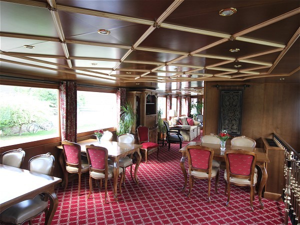 The spacious dining room aboard the Adrienne can be configured with individual tables for intimate dining