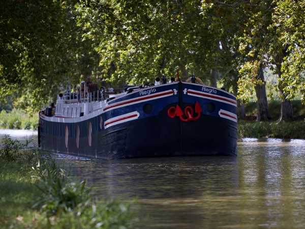 The 4-passenger Deluxe hotel barge Alegria,
cruising on the historic Canal du Midi