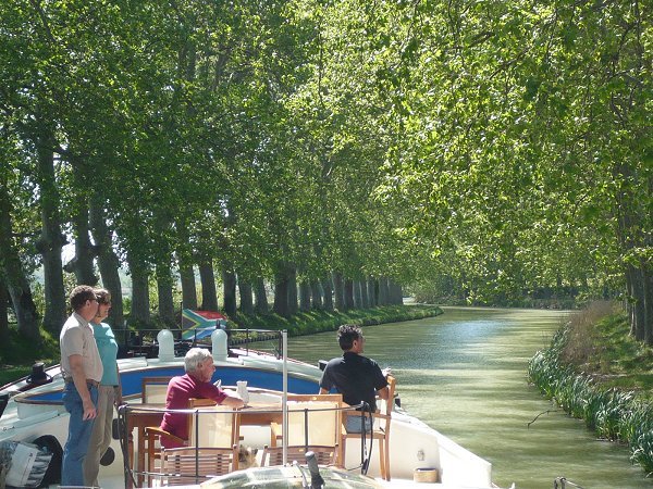 The Hotel Barge Alegria cruising on the historic Canal du Midi