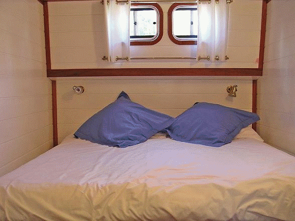 Cabins aboard Athos can be configured as queen or twin bed, each with private bath.