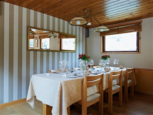 The dining room aboard the Hirondelle is
beautifully set for every meal