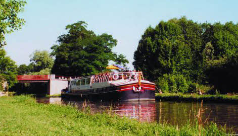 The 14-passenger Luciole, cruising the canals of France in Burgundy.