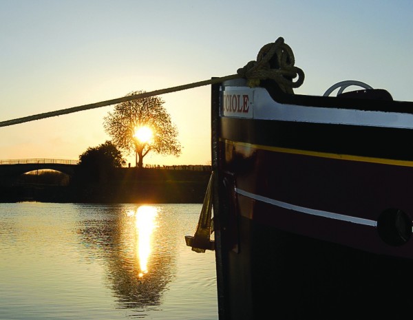 The 14-passenger Hotel Barge Luciole, cruises the canals of France in Burgundy. Shown here moored at Vermenton at sunrise.