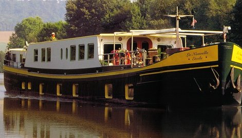 The Hotel-Barge Nouvelle Etoile, cruising in France.  The ultra-deluxe hotel barge Nouvelle Etoile cruises in Holland in the spring (Tulip Cruises), then cruises in France in Burgundy and Champagne in mid-season, and in Alsace and Germany in the Fall.  Nouvelle Etoile is one of more than 60 luxury barges in Europe and offers one of the most pampered cruises in Europe with exceptional cuisine, wines, and owner-hosts and professional crew to create an exquisite week and a lifetime memory.  Go barging on the canals of Holland and rivers of France and Germany for the vacation and holiday experience of a lifetime!