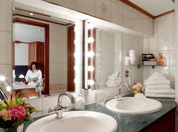 La Nouvelle Etoile's cabins feature spacious baths with double sinks, extra large walk-in shower, separate doored access to commode