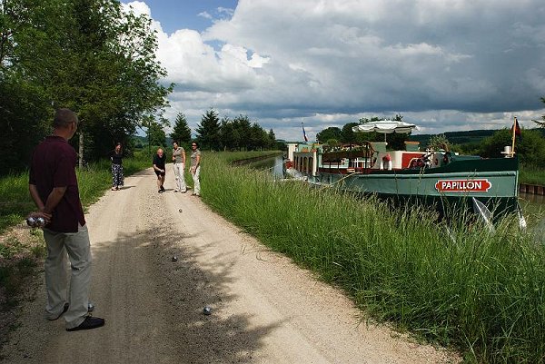 A friendly try at Boules on the canal towpath while Papillon is moored