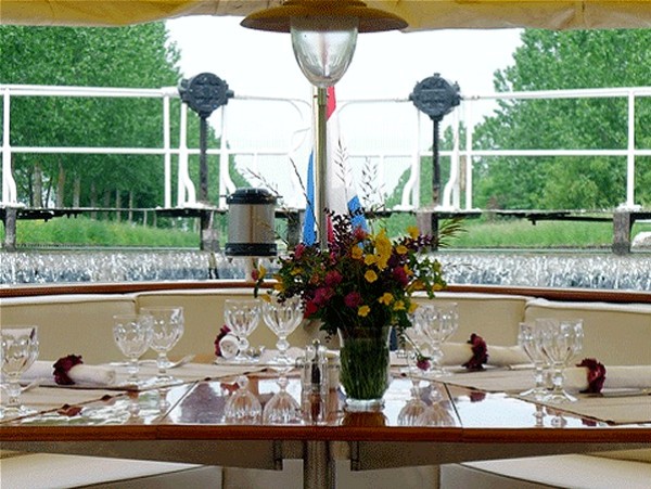 The canopied section of the deck at the stern
of the Roi Soleil is perfect for alfresco dining