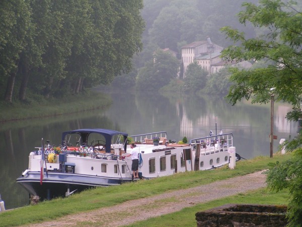 Saint Louis moored in the early morning near Castets-en-Dorthe at the start of the Canal Lateral a la Garonne.