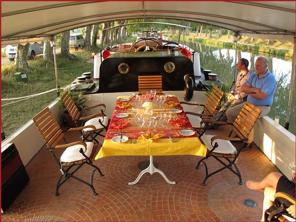 The canopied sundeck aboard the Tango is perfect for an
alfresco
meal