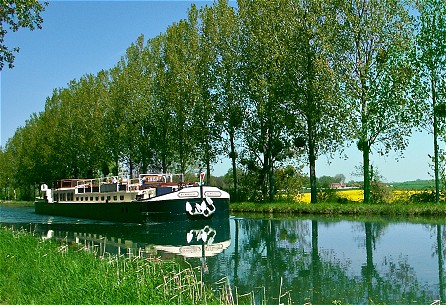 6-passenger Apres Tout, cruising a lovely stretch of the Canal de Bourgogne.