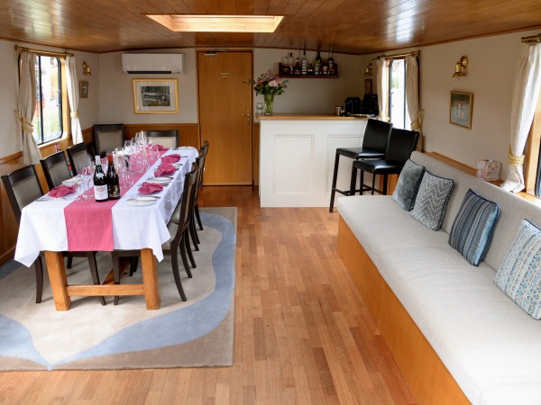 The dining table and well stocked bar aboard L'Art de
Vivre