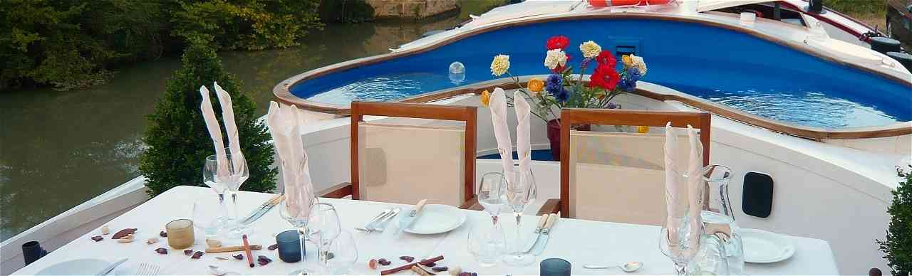 Listing of Barge Cruises, Alphabetically By Name of Barge. Pictured here is the 4-passenger deluxe barge Alegria cruising on the Canal du Midi in the South of France