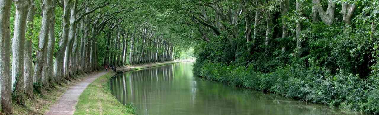 Listing of Barge Cruises, By Region. Pictured here is the beautiful and tranquil Canal du Midi in the South of France