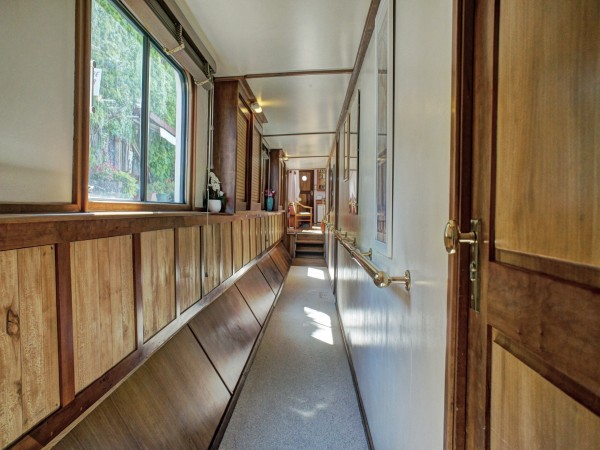 The well lit hallway leads from the salon to
passenger cabins