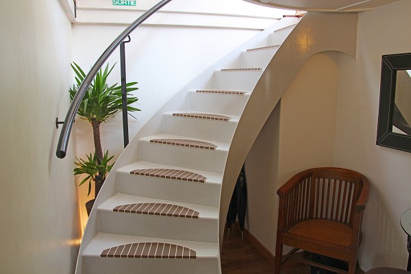 Open winding staircase leads down to cabin
level