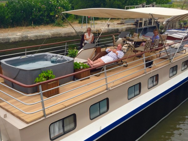 The spacious deck on board the Esperance allows plenty of
room for lounging,<br>relaxing in the spa pool and dining alfresco