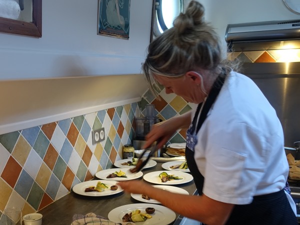 Chef preparing another delicious meal in her
galley