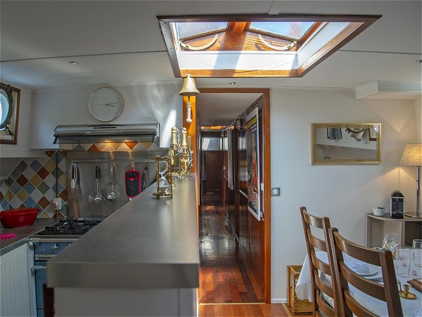 The immaculate galley and adjacent dining
room