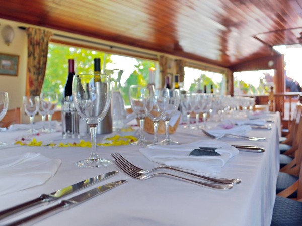 The dining room is beautifully set for every
meal aboard the Luciole
