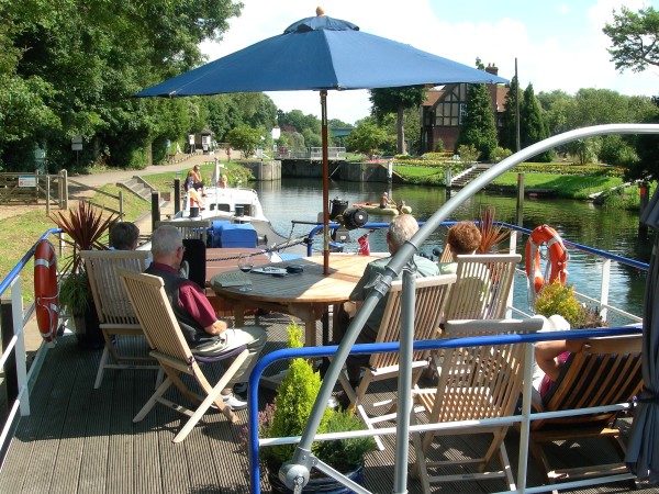 The
comfortable
sundeck aboard the Magna Carta