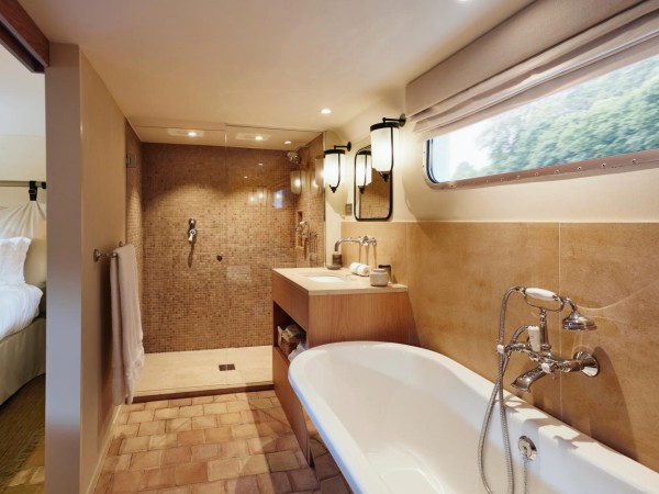 The luxurious bathrooms have sleek
modern decor with walkin showers