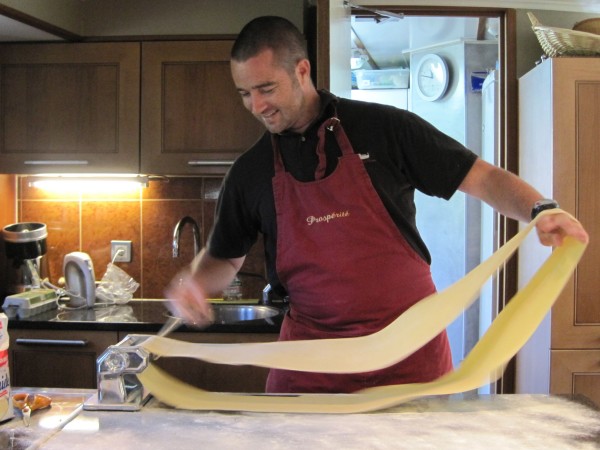 Chef Damien demonstrates his culinary skills in the open
galley on
Prosperite