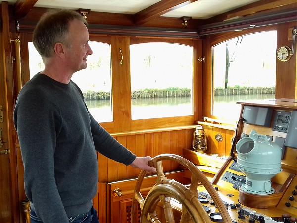 Owner and captain Tim at the helm on the Randle