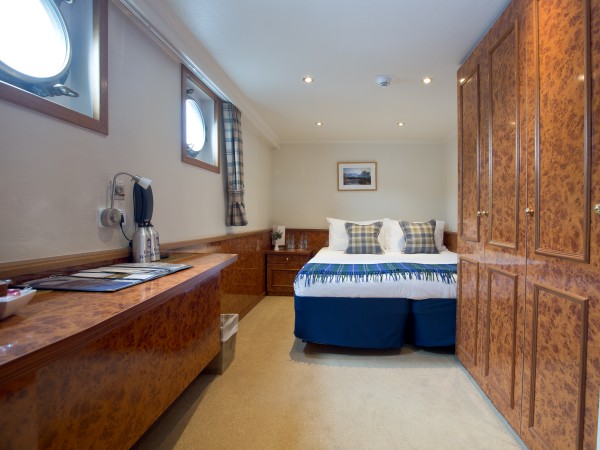 A cabin
with queen size bed on the Spirit of Scotland